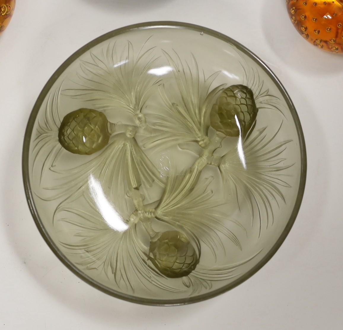 A Verlys pressed glass dish and three Whitefriars glass paperweights, dish 16cm diameter